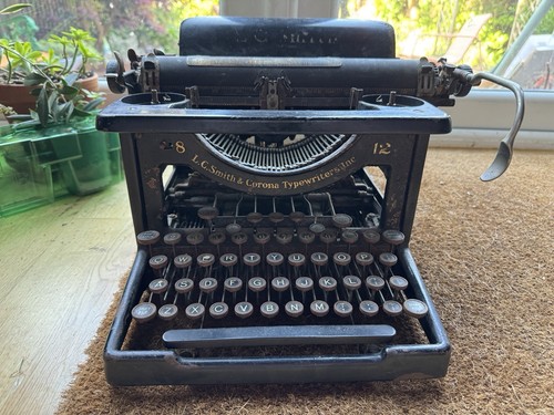 Antique smith and corona - lc,