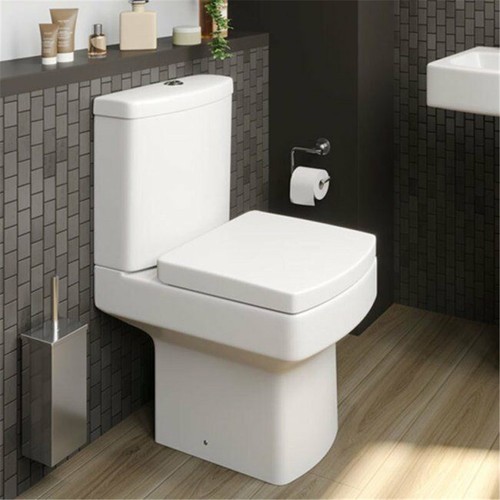 Close coupled bathroom toilet - close,