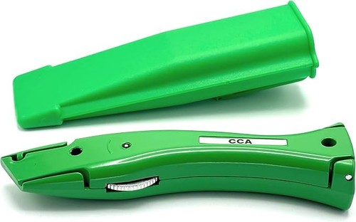Green carpet cutter - tool, with