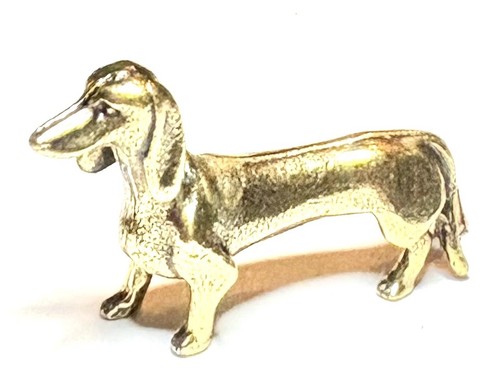 Miniature bronze dachshund dog - bronze,