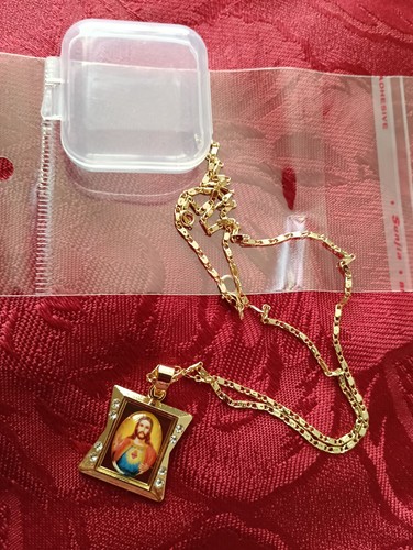 New gold coloured religious - new,