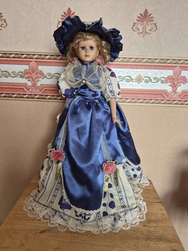 Vintage porcelain doll in - 21",