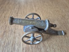 Vintage brass cannon waterloo napoleon insignia 1815 spring loaded firing 