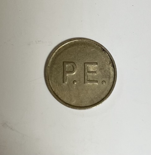 Token coin marked p e - p.e.,