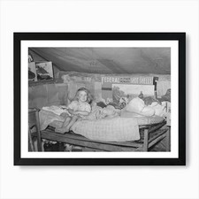 Child Sitting On Bed In Tent