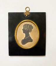 An antique Early C19th Miniature Silhouette Painting. Lacquered Frame