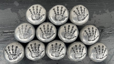 12 cabinet drawer pull knob handles, made by Turnstyle Design, classic handprint