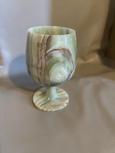 Hand carved green onyx wine - hand,