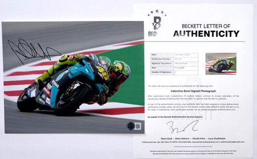 Valentino rossi signed 8x10 - rossi,