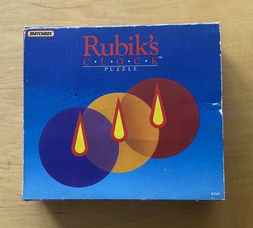 Rubik clock brain teaser - clock,