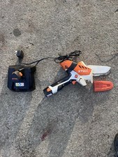 STHIL Mini Chainsaw. X2 Batteries and Charger.