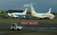 PHOTO  EAST MIDLANDS AIRPORT WITH RATCLIFFE-ON-SOAR POWER STATION IN THE BACKGRO