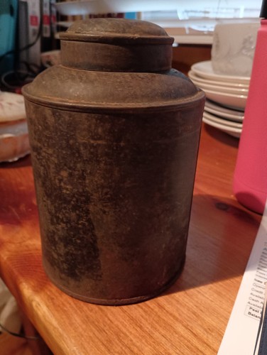 Old rusty tin tea - , canister