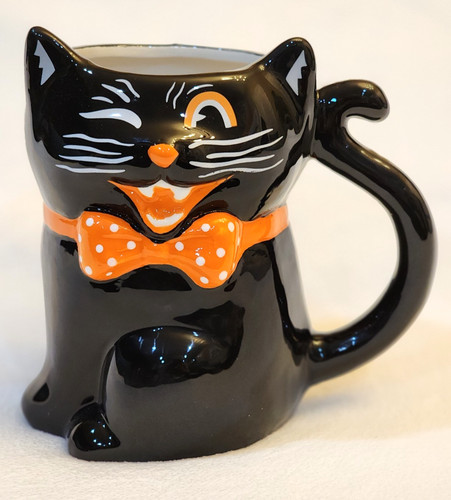 Transpac black winking male - black,
