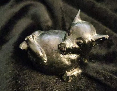 Ornamental pig lying down - pig,