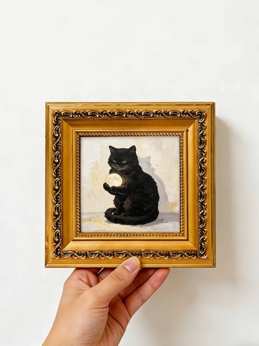 Magical cat holding glowing - magical,