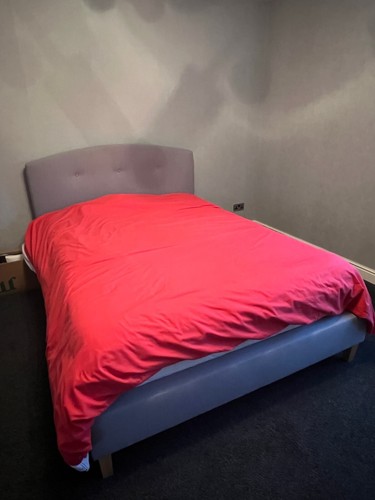 Grey double bed with memory