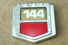 144 VOLVO CAR BADGE c.1969. Aluminium, red & beige