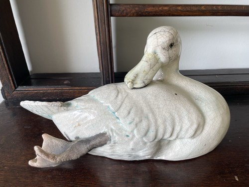 Raku model preening duck by - of,