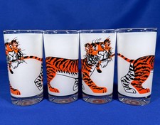 4 ESSO TIGER BITING TAIL