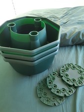 Set Of 3 Green Plastic Planters With Magic Watering Trough Around Outside.