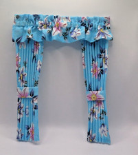 Dolls house curtains.  Bright