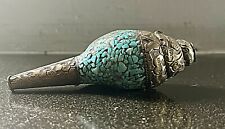 Tibetan blowing conch sea