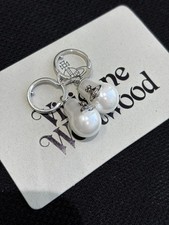 Vivienne Westwood Pearl Drop Orb Silver Earrings with packaging