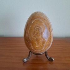 Egg shaped ornament with stand