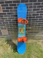 DC Focus Snowboard In Blue With Orange Flux Bindings