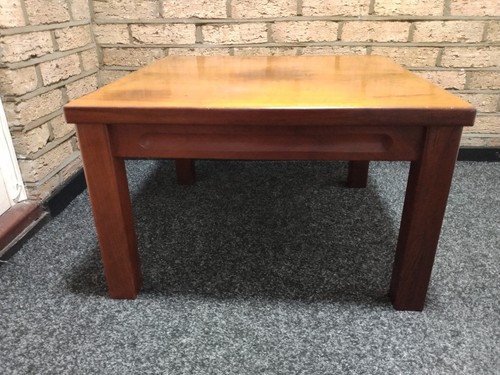 Hardwood table with - , veneered