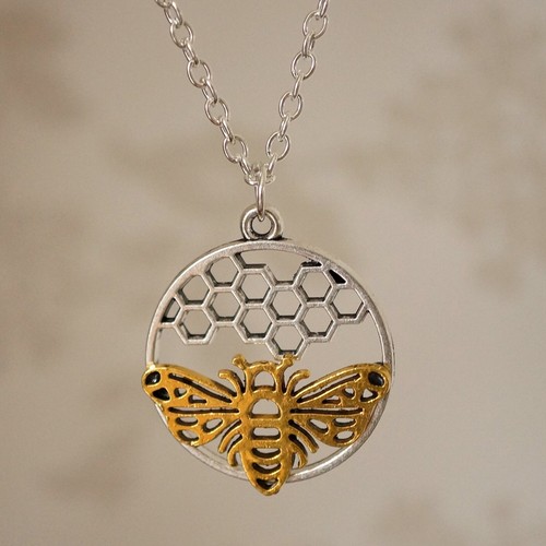Gold silver bee - bee, honeycomb