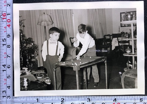 Two children shooting pool - two,