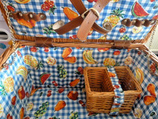 A PICNIC BASKET EMPTY IN TAN