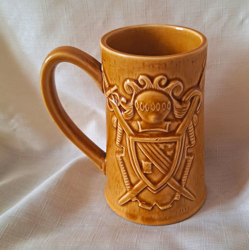 Ceramic beer tankard with - beer,