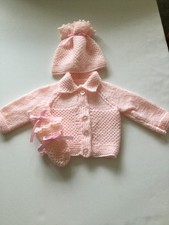 New hand knitted babies 3 piece set in pale pink dk yarn to fit size 16"