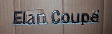Lotus 'Elan Coupe' script badge. Good Condition. Price Reduced.