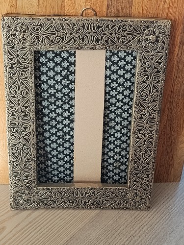 Old repoussé metal - metal, mirror