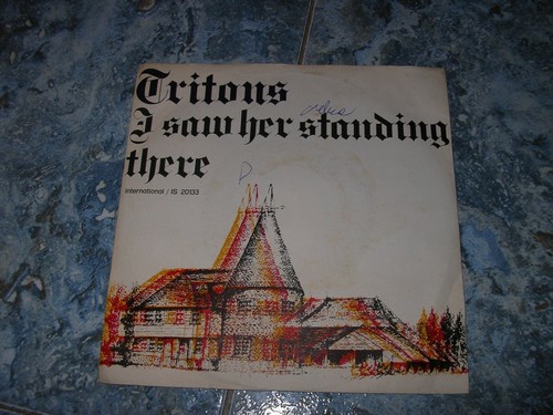 Tritons saw her standing - -,