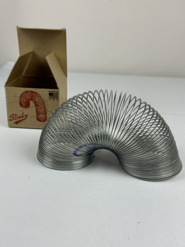 Vintage slinky metal spring - vintage,