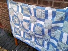 Blue and white lap quilt