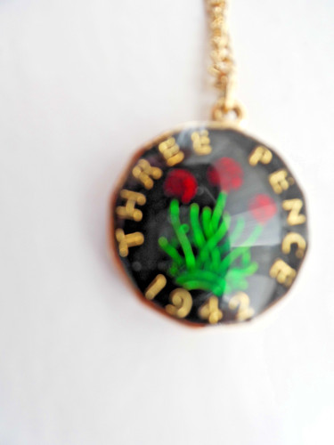 Enamelled three pence coin - three,