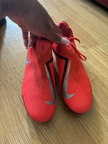 Neon orange football shoes - football,