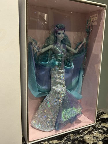 Barbie gold label faraway - label,