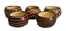 A Vintage Collection Of 5 African Geometrically Carved Gourd Vessels