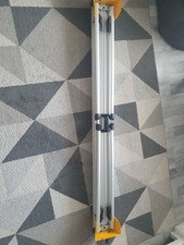 A photo shows a guide rail for