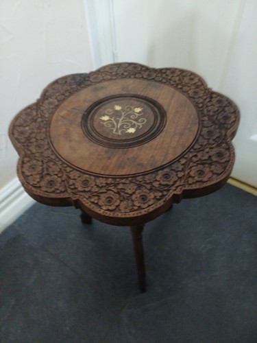 Carved inlaid with - ,