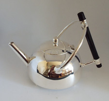 CHRISTOPHER DRESSER DESIGNED SILVER PLATE 'CIRCULAR' TEAPOT