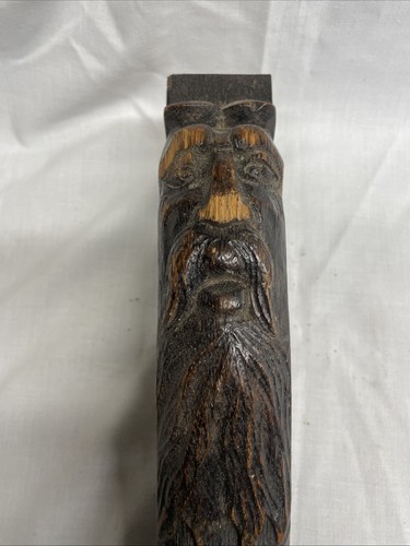 Carved green man oak panel - green,