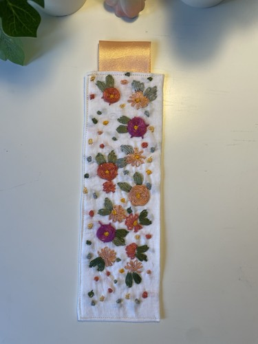 Hand stitched embroidered - hand,